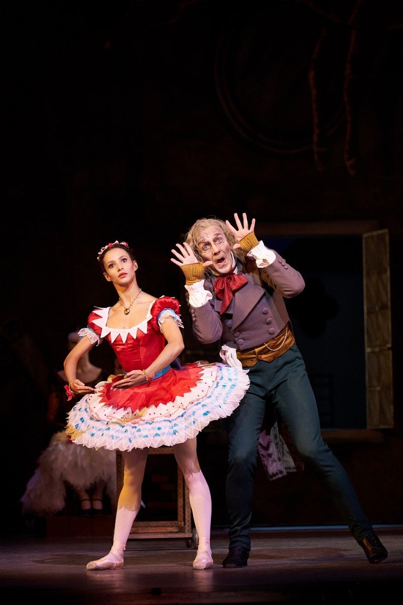 Coppelia. Francesca Hayward as Swanilda and Gary Avis as Dr Coppelius. c ROH 2019. Photographed by Bill Cooper. 1 Coppelia. Francesca Hayward as Swanilda and Gary Avis as Dr Coppelius. (c) ROH, 2019. Photographed by Bill Cooper. (1)