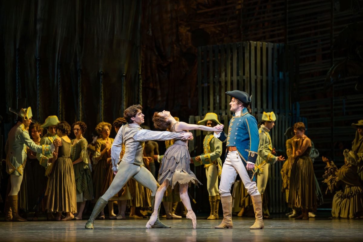 Cesar Corrales as Des Grieux Akane Takada as Manon and Thomas Whitehead as Gaoler in Manon The Royal Ballet ©2026 Mihaela Bodlovic Cesar Corrales as Des Grieux, Akane Takada as Manon and Thomas Whitehead as Gaoler in Manon, The Royal Ballet ©2026 Mihaela Bodlovic